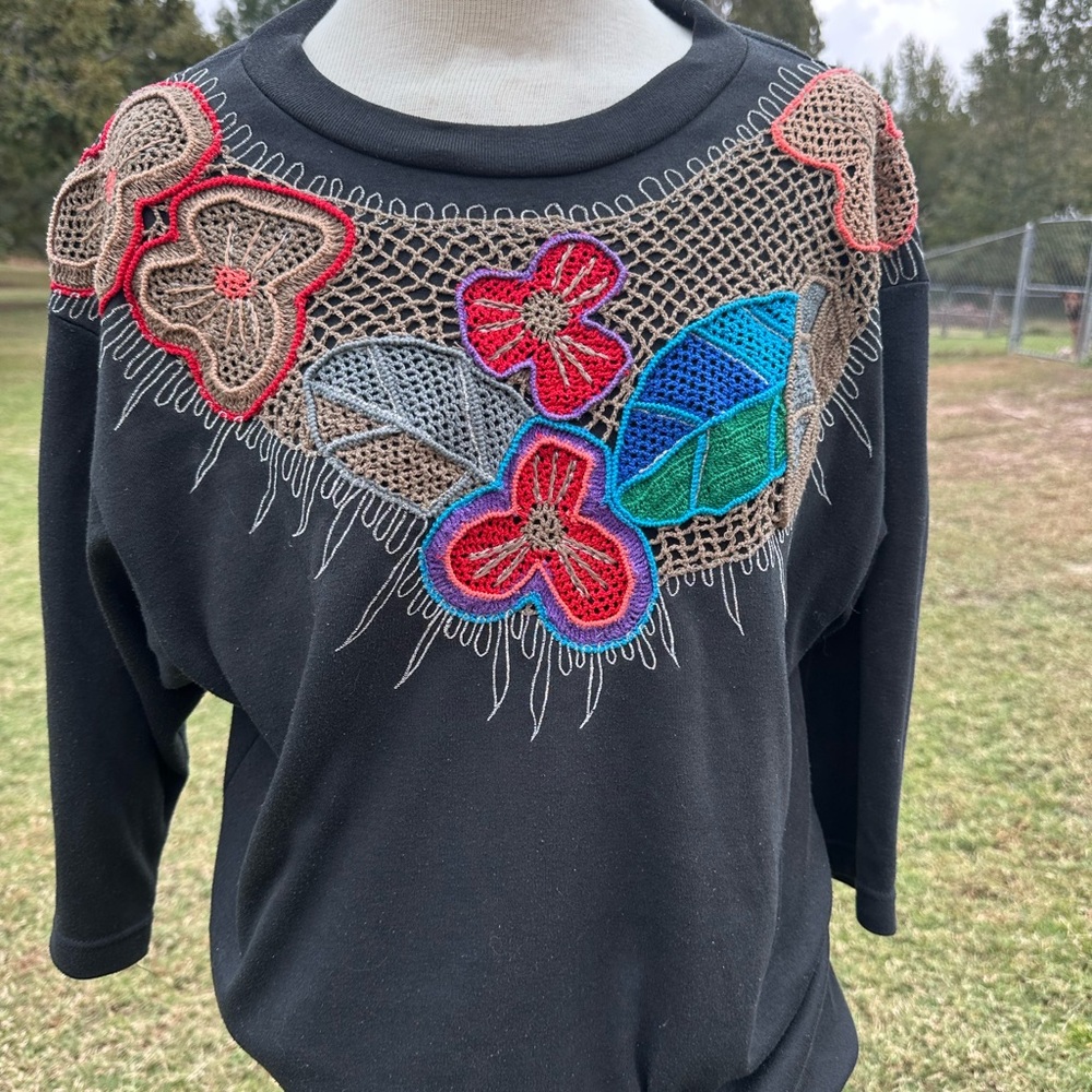 Black Sweater with Colorful Crochet Design